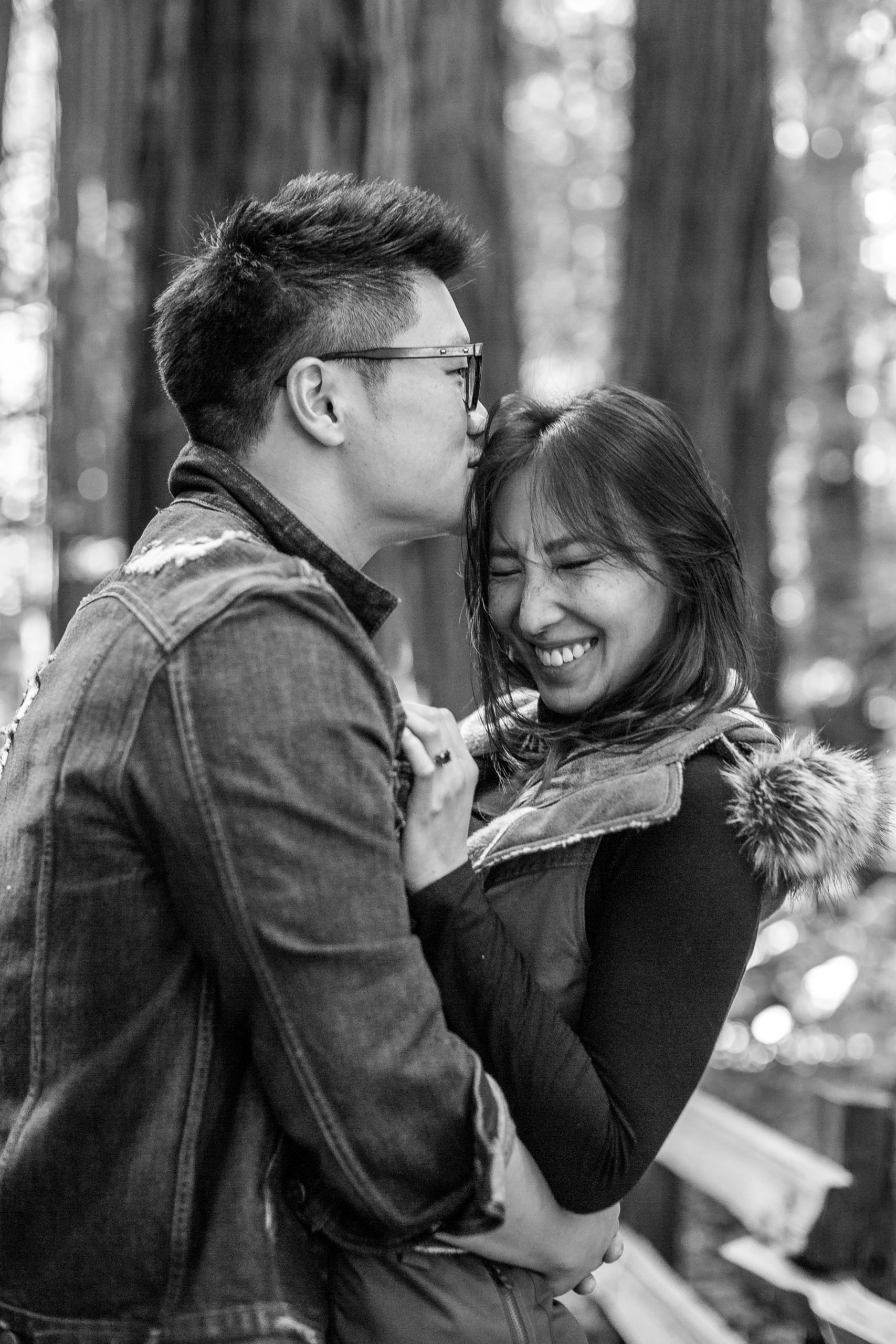 rebecca skidgel photography bay area engagement photographer muir woods couple looking at each other in redwoods